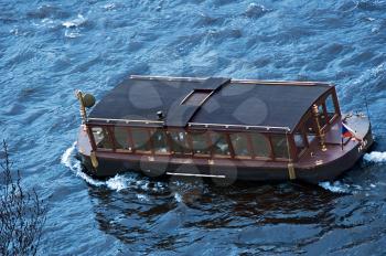 Touristic ship on the river Vltava in Prague,Czech Republic