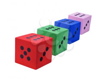 ?olors of luck. Multicolor foam dice isolated on white background