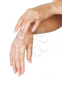 Two woman hands with moisturizer body cream isolated on white