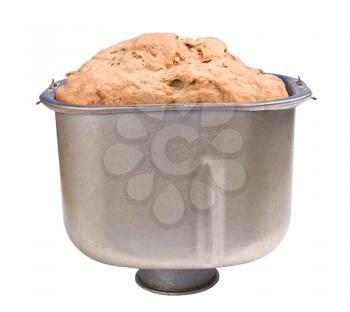 Homemade bread loaf in the bread pan isolated on white