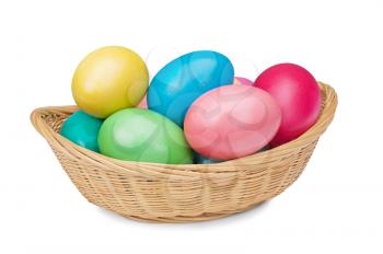 multicolored and colorful Easter eggs in the wattled basket isolated on white background