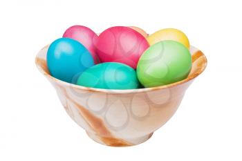multicolored Easter eggs on the ceramic plate isolated on a white background