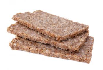 Real German whole grain rye bread slices isolated on white