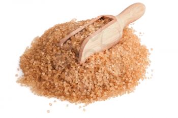 heap of brown sugar and wooden scoop on white background

