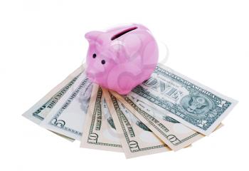 Pink piggy bank with banknotes isolated on white background