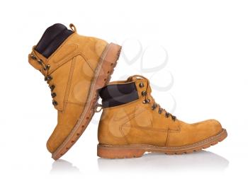 New yellow working boots isolated on white