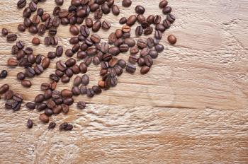 coffee beans as background  on the old wooden table