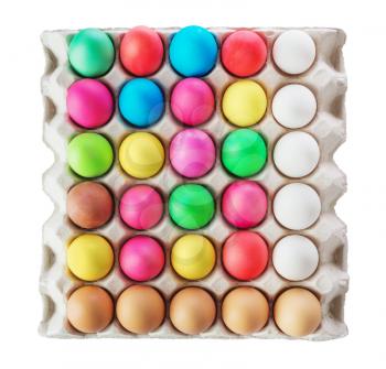 multicolored Easter eggs in the cardboard box isolated on a white background 