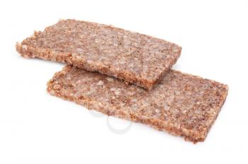 Real German whole grain rye bread slices isolated on white