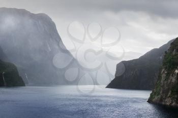 Milford Sound fiord in storm and rainy weather.
Fiordland national park, New Zealand 