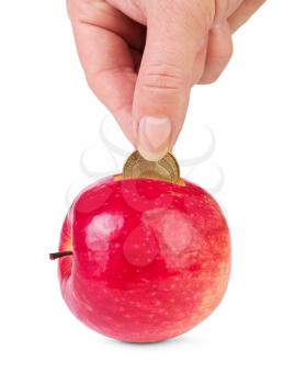 Fresh apple as piggy bank and hand with coin isolated.
Concept of  healthy lifestyle investment .