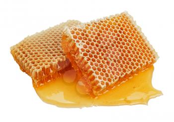fresh golden honeycomb isolated on white background 