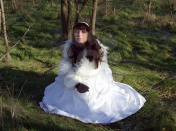 Royalty Free Photo of a Bride in a Park