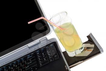 Royalty Free Photo of a Cocktail and Laptop