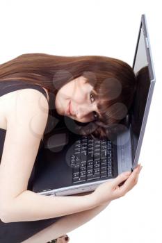 Royalty Free Photo of a Woman Resting Her Head on a Laptop