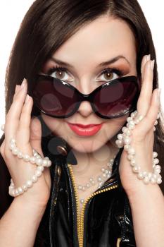 Royalty Free Photo of a Girl in Beads and Sunglasses