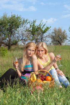 Royalty Free Photo of Two Girls Having a Picnic