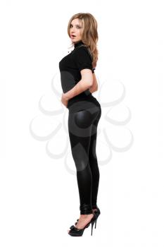 Royalty Free Photo of a Young Woman in Tight Pants and Heels