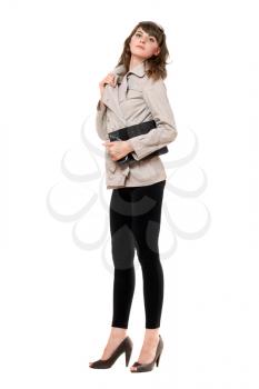 Royalty Free Photo of a Young Woman in a Grey Jacket and Black Leggings