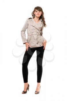 Royalty Free Clipart Image of a Woman in a Jacket and Leggings