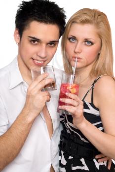 Royalty Free Photo of a Young Boy and Girl Drinking