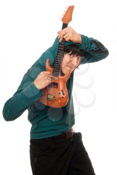 Royalty Free Photo of a Man Playing a Little Guitar