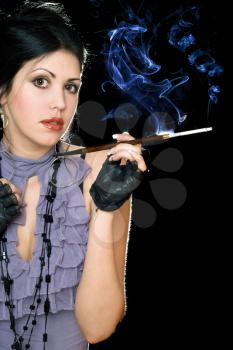Royalty Free Photo of a Woman Smoking