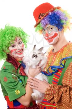 Royalty Free Photo of Two Clowns and a Rabbit