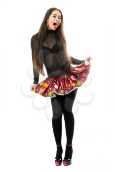 Royalty Free Photo of a Young Girl Flipping Her Skirt