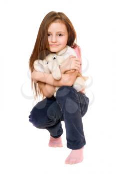 Royalty Free Photo of a Little Girl With a Stuffed Toy Elephant
