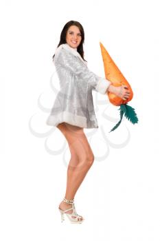 Royalty Free Photo of a Woman Holding a Plastic Carrot