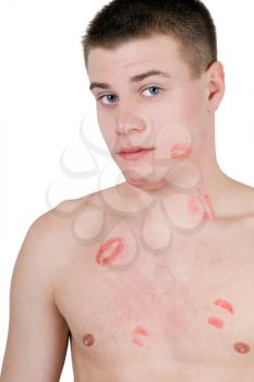 Royalty Free Photo of a Shirtless Man Covered in Lipstick