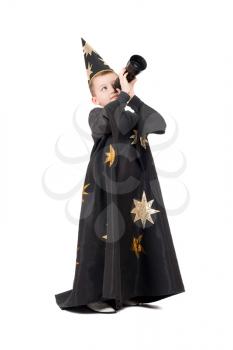 Royalty Free Photo of a Little Boy Dressed Like an Astrologer Looking Through a Telescope