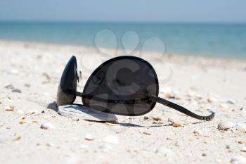 Royalty Free Photo of Sunglasses on a Beach