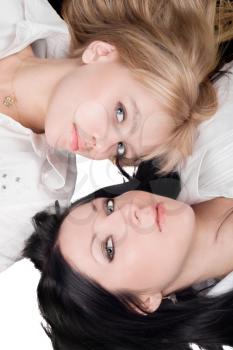 Royalty Free Photo of Two Women Lying on the Floor