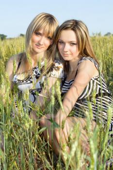 Royalty Free Photo of Two Girls in a Field