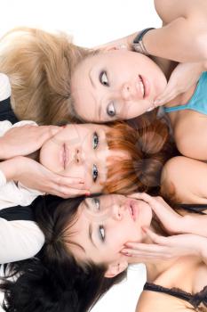Royalty Free Photo of Three Women With Their Heads Touching