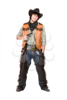 Royalty Free Photo of a Cowboy with a Gun