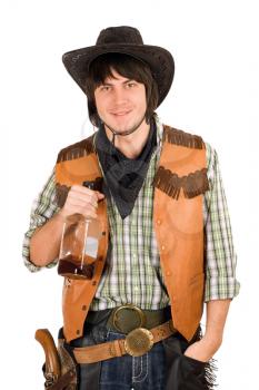 Royalty Free Photo of a Cowboy With Whiskey