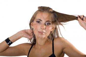 Royalty Free Photo of a Girl Tugging Her Hair