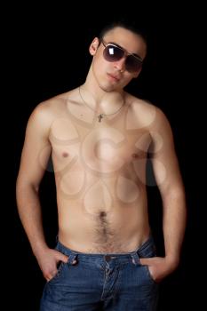 Royalty Free Photo of a Young Shirtless Man in Sunglasses
