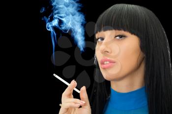 Royalty Free Photo of a Woman Smoking a Cigarette