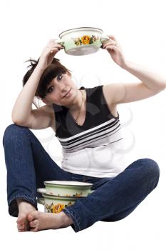 Royalty Free Photo of a Woman With Saucepans