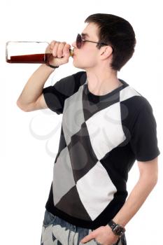 Royalty Free Photo of a Young Man Drinking