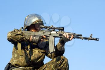 Royalty Free Photo of a Sniper in Camouflage