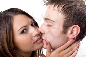 Royalty Free Photo of a Man and Woman Kissing