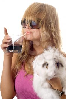 Royalty Free Photo of a Girl With a Rabbit and Drink