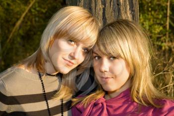 Royalty Free Photo of Two Blonde Women Outside