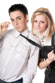 Royalty Free Photo of a Girl Pulling on a Boy's Tie