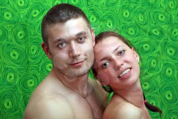 Royalty Free Photo of a Young Couple With Bare Shoulders